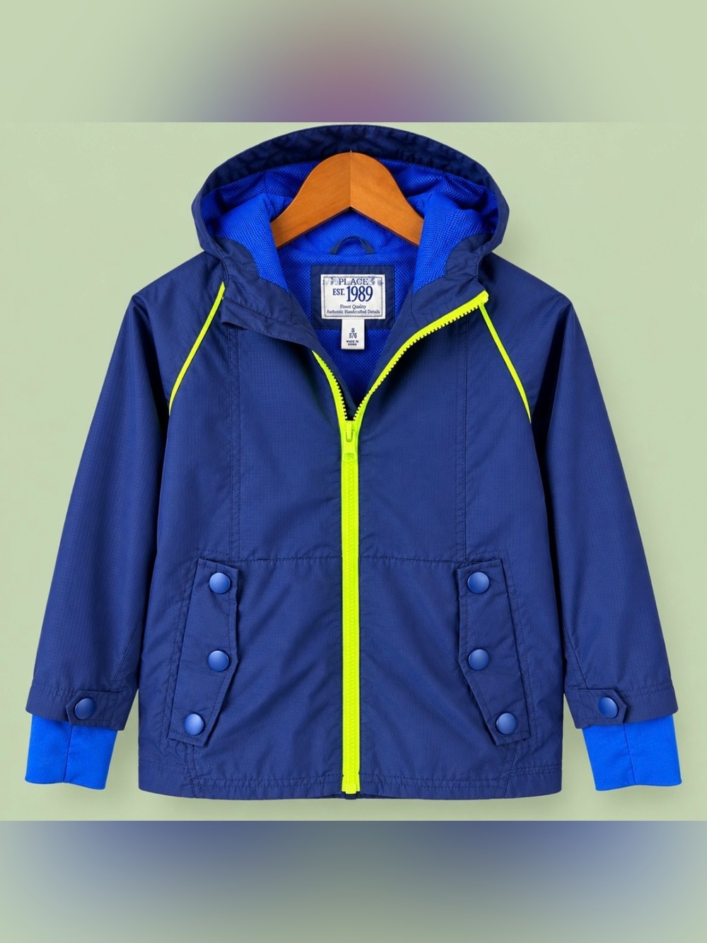 A sporty lightweight layer with a fun pop of color.